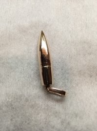Я одному заказчику снимал копию такой пули в золоте.