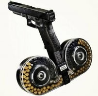 Во-первых - непонятно, как патроны в ствол у этой "системы" попадают, это ж "типа револьвер"?
Во-вторых - непонятно, как отдачей не отбивает владельцу "приблуды" писюн и не ломает лобковую кость?
Совершенно не функциональная херня, придуманная "чисто ради прикола"

Ну, и в-третьих - "яйца Гастона Глока"  кроют эту "оружейную нелепицу", как бык овечку.