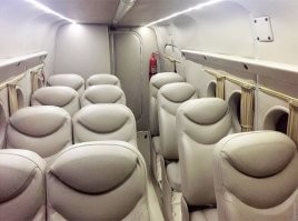 Господа, а чем вам Ан-2 так не нравится?
Кресла нормальные, туалет есть, багажные полки над головой - вот они. Шумоизоляция присутствует. Отопление от двигателя - так оно везде от двигателя. Стюардессы разве что нет и в полете не кормят, так и лететь два часа от силы. Или вы с Ан-2 только прыгали? Так десантный, он десантный и есть. Для парашютистов в экипировке, а не для пассажиров.