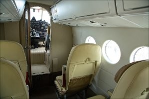 Господа, а чем вам Ан-2 так не нравится?
Кресла нормальные, туалет есть, багажные полки над головой - вот они. Шумоизоляция присутствует. Отопление от двигателя - так оно везде от двигателя. Стюардессы разве что нет и в полете не кормят, так и лететь два часа от силы. Или вы с Ан-2 только прыгали? Так десантный, он десантный и есть. Для парашютистов в экипировке, а не для пассажиров.