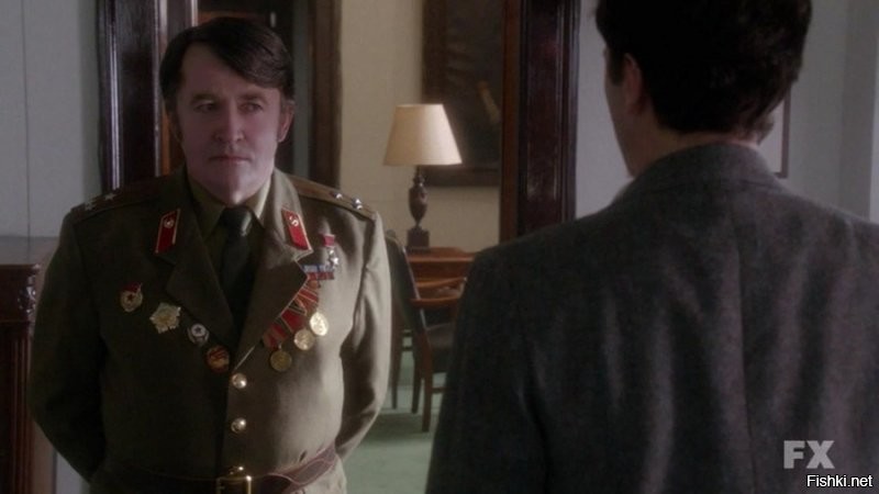 В 1961 году, он еще носил перевернутые погоны... и перевернутые петлицы КГБ...