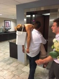 А вот тут все абсолютно понятно - дева перебрала, а парень очень заботлив и ответственен (вероятно, всерьез влюблен), но не хочет чтобы любимая его обблевала...