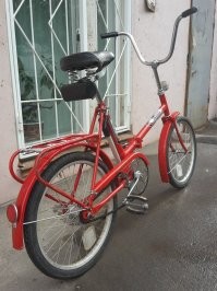 в смысле "в каком"? написал же - под седлом
вот, прям как последняя из Кам, что у меня была, уже Made in Russia. Только переднего тормоза почему-то нет (у меня был) и катафоты стремные