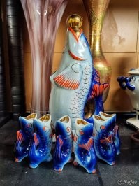 Не берите, если только для эстетических целей -  поставить на полку, с практической точки зрения (для выпиванции) очень неудобны - голову приходится очень высоко задирать, потому как у рыбок тело изогнуто и не вся жидкость из нее выливается.  Есть у меня такие дома, это я вам как эксперт по рыбкам говорю.