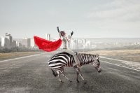 Почему на зебре? она была на машине!
Вот за зебре: