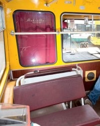 В ЛиАЗе-677 ("скотовозе", "луноходе", "сотке") была еще парочка козырных мест, кроме того что на картинке.
а) во время давки в час-пик - в закуточке слева от задней двери. Там никто не мешал, особенно, если еще стоял поручень, отделяющий его от остального салона (от вертикального до заднего борта). Правда стоять приходилось на кожухе привода дверей;
б) зимой в морозы - место слева у окна на переднем сиденье за водителем - там был выход печки салона :). Но это только при пустом автобусе, ибо когда толпа - выбраться оттуда было малореально.