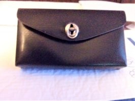 У меня тоже был клач. С парой гаечных ключей, и ниппелем. 
На раме велосипеда висел.