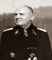 Вилли Леман – сотрудник Гестапо, начальник отдела контрразведки на военно-промышленных предприятиях Германии, гауптштурмфюрер СС и криминальный инспектор. Тайный агент советской разведки с 1929 года, ставший за время почти тринадцатилетнего сотрудничества с ней одним из наиболее ценных.
Несмотря на то, что Юлиан Семёнов, создатель образа легендарного Штирлица, в своих интервью неоднократно говорил о том, что его герой – образ собирательный, он всё же немного недоговаривал. У героя Юлиана Семенова был реальный прототип.

В штаб-квартире СВР в Ясенево писатель очень внимательно изучал документы об агенте Советской разведки под псевдонимом «Брайтенбах» кодовый номер А-201 работавшим в гестапо и ставшим прототипом легендарного персонажа «Семнадцати мгновений весны». Правда, по совету товарищей из ЦК КПСС писатель сделал чистокровного немца Вилли Лемана русским Максимом Исаевым.
Одно дело, когда это Максим Максимович Исаев, которого мы внедрили в гестапо, а другое дело – настоящий гестаповец. И вот этот немецкий полицейский, который, кстати, имел личную благодарность от Геринга за то, что принимал участие в «ночи длинных ножей» в 1934 году. Наверное, там он получил эту благодарность не за благотворительную деятельность.

Правда, герой Юлиана Семёнова в романе действовал не в начале, а в конце войны. Но, как и книжный Штирлиц, Вилли Леман действительно был правой рукой шефа германской разведки Вальтера Шелленберга. Он отвечал за контрразведывательное обеспечение военной промышленности Рейха. Однако судьба реального разведчика Вилли Лемана сложилась куда трагичнее, чем у его литературного коллеги.