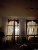 У меня окна выходят на стадион. И хотя до него километра три, один из прожекторов находится в прямой видимости и направлен прям в окно. Летом ещё ничего, а зимой, такая же фигня как на картинке.