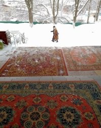 Знаю такую плитку. Шмякнулся на такой, да ещё и рукой приложился к швеллеру, из которого пандус для инвалидов сделан. 
Лучше бы и там ковры положили!