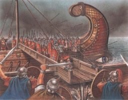 Не согласен с автором. 
Я не историк и не специалист в кораблях вообще ни разу. Но образование инженера и здравый смысл имею.
Итак. В основании корабля (парусного или гребного или стального) находится киль. Киль – массивная прочная продольная балка, являющаяся главной частью набора корпуса. Фактически это «хребет», «позвоночник» корабля. К нему крепятся «рёбра» судна – шпангоуты, несущие на себе наружную обшивку корпуса (обшивку корпуса старинного парусника составляют доски, скрепленные гвоздями).
Как вы думаете, если массивной прочной длинной балкой, да ещё имеющей на конце заострение и обитое металлом пробьёт обшивку из тонких дощечек? Думаю да и очень легко. Сильно при этом пострадает корпус таранящего корабля? Если таран вынесен далеко от его корпуса - то практически не пострадает, его таран остановится раньше, чем обшивка встретится с вражеским бортом. Судя по чертежу, любая хорошая пробоина ниже ватерлинии - это верное потопление корабля. А таран расположен как раз ниже ватерлинии и прочно связан с килем корабля.

Теперь что касается ворона. Не забывайте, что на вёслах вряд ли ходили быстрее 5-ти узлов (около 10 км/ч). То есть скорость бегущего обычного человека, не спортсмена. На такой скорости, думаю, легко было пользоваться такими трапами для переправки воинов на вражеский борт. Ну во всяком случае это легче, чем карабкаться с борта на борт - руки заняты и воин в процессе перелезания беззащитен. Хотя, думаю, что на вражеский борт проникали и по ворону и перелезанием через борт.

Какая основная цель морского сражения? Потопить вражеский корабль или его захватить. Правильно? Получилось протаранить в борт зазевавшего противника - хорошо, помахали ручкой тонущему кораблю и пошли разбираться с другим. Не получилось? Абордаж. А перед этим обработать по максимуму стрелами, чтобы потенциальных защитников из экипажа. Таким образом, таран - не основное оружие и средство. Послушать автора, так получается, что не находили древние корабли или массивные бронзовые или медные наконечники таскали просто так... лишь бы гребцам не было скучно? Это врядли, если б этот способ был не эффективен, то лишний груз никто бы не таскал по морям... Не надо считать древних римлян или греков дураками. Усиливали таран бронзой или медью, думаю, по той причине, что стали усиливать обшивку кораблей ниже ватерлинии. Типичное соревнование защиты и оружия, которое должно её пробить.
 
На исключительно парусном корабле, думаю, что таранить вражеский корабль опасно - мачты не выдержат. Как потом грести домой? Вот и отказались от таранных приспособлений, как от лишнего груза.

PS Таран эффективен и по сей день. По воспоминаниям советских подводников, американские военные надводные корабли практически всегда пытались протаранить зазевавшуюся советскую подводную лодку.
