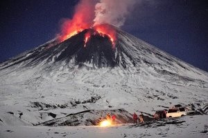 "На Курилах произошло неожиданное." - извержение вулкана на Камчатке и Курилах неожиданное? 

Каталог П.Т. Новограбленова  насчитывал 19 действующих вулканов.
Просто примеры:
Авачинский. Даты последних проявлений: 1909, 1926, 1938, 1945, 1991, 2001 года. 
Горелый. Последние извержения происходили 1931, 1932, 1947, 1961, 1980, 1984, 2010-2014 года.
Жупановский. Последние проявления активности были замечены в 1929, 1940, 1956, 2013, 2014, 2015, 2016 годах.
Карымский. Последние извержения датируются 1955, 1960, 1970, 1976, 1996 годами.
Кизимен. Дата последнего извержения 2013 год. 
Корякский. Последний раз этот гигант проявил себя в 2009 году.
Мутновский. Последние извержения от 1945, 1960, 1996, 2000, 2007, 2013 годов.
Плоский Толбачик проявил себя в 2013 году.

Фото - Ключевская сопка.