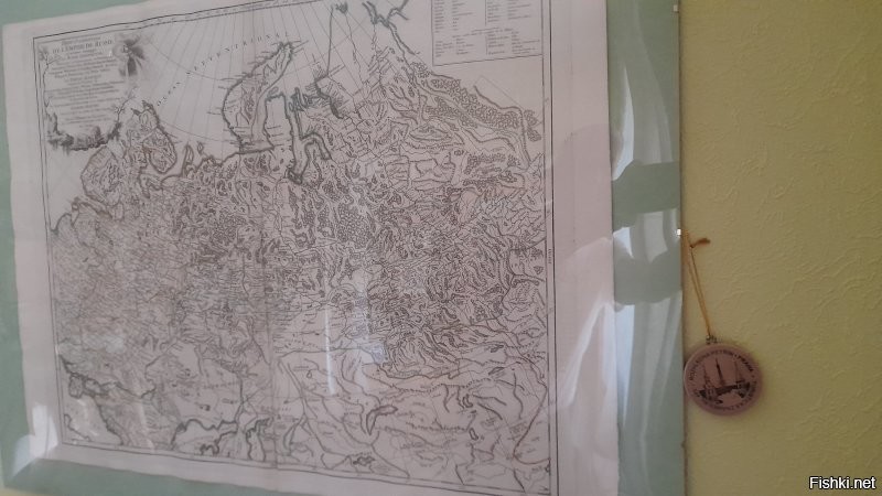 Дружище, твоя карта ничуть не стариннее того паспарту, на чём она закреплена  В книжных магазинах продаётся, в детских отделах. Для антуража детских комнат.
Не факт, что современные оформители там ничего не приукрасили. 
А вот это карта 1750 г. из моей коллекции (вместе с моим отражением на  защитном пластике  ). 
К сожалению, там нет территории современной западной Украины, т.к. карта показывает европейскую и частично сибирскую части Российской империи.
Но та часть, что под сегодняшним вниманием, имеется. И слова "Украина" я там не вижу.