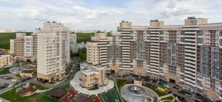 На улице Академика Виноградова наверное сейчас вот так, вместо деревянных хибар.