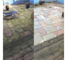 Так это как раз от того, что дожди практически постоянное состояние погоды.

Это не грязь, а grünbelag, дословно зелёное покрытие, но а по факту мох от повышенной влажности.

1 начальная стадия, становится серым и тёмным
2 фото запущенная стадия, когда уже вовсю "цветет"

Это совершенно нормально для  влажных стран типа Англии, Германии  и тд.