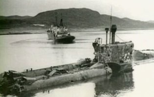 Разрешите кое-что добавить, без этого Ваш рассказ был бы не полон:
Подводная лодка С-80 (зав. № 801) была заложена 13 марта 1950  на эллинге ССЗ №112 Красное Сормово" им. А.А. Жданова в г. Горький как головная средняя подводная лодка проекта 613.  21 октября  1950 года спущена на воду. 
 9 июня 1951 года было проведено глубоководное погружение на 203 м. В наиболее «слабых», по мнению инженеров, местах установили приборы, измеряющие напряжение конструкций. Затем лодку с экипажем в отсеках «на талях» опускали на критическую глубину. Рядом в полигоне дежурили спасатели на своем судне. В случае аварии водолазы должны были прикрепить к корпусу лодки понтоны, чтобы затем поднять ее на поверхность;
1955 год. В течении года дважды имело место поступление воды внутрь прочного корпуса ПЛ. При погружении из-за неисправности арматуры в трюме первого отсека и при срочном погружении из-за деформации штока привода захлопки вытяжной вентиляции;
1957 год 1 июля -1959 год апрель. На ССЗ "Красное Сормово" выполнены
модернизационные работы по проекту 644 (В 1956-1957 гг. для использования крылатых ракет комплекса П-5 был разработан проект 644 переоборудования лодки пр. 613 (ЦКБ-18, СКБ-112, рабочие чер. П.П. Пустынцев). А уже к концу 1960 года в составе ВМФ СССР было шесть ПЛ пр. 644. Это были первые серийные отечественные ПЛ с крылатыми ракетами).
После окончания модернизационных работ была переведена в г. Молотовск (с 12.09.1957 - г. Северодвинск).
1961 год 25 января. Вышла в море на несколько суток для отработки и совершенствования задач одиночного плавания. Для стажировки на борту находилась часть личного состава экипажа ПЛ С-164 во главе с командиром кап.Зр. Николаевым В А;
1961 год 27 января. Последнее сообщение поступило около 00.30. По заключению комиссии по расследованию гибели ПЛ, в 01.30 С-80 затонула из-за поступления воды через шахту РДП. вследствии обмерзания поплавкового клапана. Весь экипаж (68 человек) - погиб:
1961 год 14 марта. Исключена из состава ВМФ. Прибывшая на СФ комиссия Министерства обороны под председательством маршала Советского Союза Рокоссовского К.К. не смогла однозначно назвать причины гибели лодки, сделав лишь заключение, что «...на лодке произошла тяжелая авария, связанная с поломкой техники, с которой экипаж в условиях урагана не смог справиться». По результатам расследования был снят с должности командир БрПЛ кап. 1р. Сухомлинов В.И.:
1968 год 23 июня. Обнаружена на глубине 196 м. без дифферента с креном 35-37  на правый борт в точке с координатами 70 01'23" с.ш., 36 35'22" в.д. В спускаемой наблюдательной камере с СС "Алтай", в сложных и опасных условиях, для тщательного обследования операторы произвели девять спусков продолжительностью по 2-4 часа:
1969 год 9 июня. Начало работ по подъему затонувшей ПЛ силами специально сформированной экспедиции особого назначения (ЭОН-69. в некоторых источниках указывается как ЭОН-10. хотя ЭОН с таким номером осуществляла переход на ТОФ в 1940 году) под командованием кап. 1р. Минченко С.В.:
1969 год 5 июля. С помощью глубоководных гиней СПС «Карпаты» ПЛ оторвали от грунта и переместили на 60 м в сторону, где вновь положили на грунт. Все работы по заведению подъемных устройств под водой контролировались с помощью наблюдательной камеры НК-300 (20 спусков, 67 часов под водой) и глубоководной рабочей камеры РК-680 (67 спусков. 172 часа под водой);
1969 год 10 июля. При абсолютном штиле и сплошном тумане СПС "Карпаты" снялось с бочек и начало буксировку с приподнятой над грунтом С-80 со скоростью 2,5 узла. Через 38 ч. ПЛ опустили на грунт на глубине 51 м в бухте Завалишина Териберского залива для переотстропки легководолазами:
1969 год 24 июля. В 20.30 ПЛ подняли на поверхность и отбуксировали в губу Наша Териберского залива:
1969 год август. В августе на борт СПС "Карпаты" прибыла и начала работу Государственная комиссия, сформированная из высококвалифицированных специалистов ВМФ и Судпрома под председательством Героя Советского Союза вице-адм. Щедрина Г.И :
1969 год октябрь. Расформирование ЭОН-69. По самой ПЛ комиссия сделала заключение о нецелесообразности проведения восстановительных работ. ПЛ была взорвана и разделана на металл (на базе "Главвторчермета" на м. Зелёный в Кольском заливе разделана на металл). Часть конструкций ПЛ оставлены на берегу бухты Завалишина. Там же, в районе 1-го Титовского ручья, находится неизвестное захоронение, предположительно, СПК кап.Зр. Осипова В.Е. и КБЧ-2-3 кап.л-та Черничко В.П.. которые в момент аварии находились в боевой рубке.