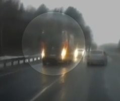 Так он свою жизнь дороже оценил. 

Провтыкал, что впереди грузовик стоит. А врезаться в него - верная смерть. Его бы там просто сплющило. 
А легковушка низкая, она у него в раме застрянет, кабина выше. 
Вот он и пошёл на встречку. И похрен ему, на всех остальных. 

А на обочину он не смог бы уйти, там ограждение. 
Не втиснулся бы он между ним и грузовиком, всё равно бы сплющило.