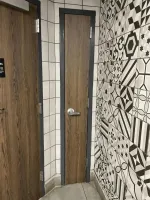 Большая часть ни о чём.
Что странного,  если это, например, сортир в пабе и  за этой дверью стояки и инвентарь уборщицы?