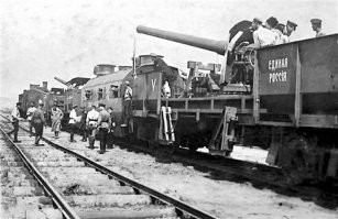 11. Моряки у самолёта, мне кажется, что это позднее, чем 1918-й, скорее конец 20-х, или когда самолёты из металла делать стали.

Ещё несколько фото того времени
1. Белый бронепоезд
2-3 Пропагандистские листовки Добровольческой армии Деникина