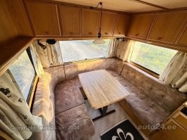 А чем плохи обычные прицепы кемперы? 
Например такой, без всяких тайных комнат, с  туалетом и душем.
В чем суть стартапа?