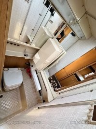 А чем плохи обычные прицепы кемперы? 
Например такой, без всяких тайных комнат, с  туалетом и душем.
В чем суть стартапа?