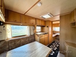 А чем плохи обычные прицепы кемперы? 
Например такой, без всяких тайных комнат, с  туалетом и душем.
В чем суть стартапа?