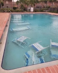 Проблема в том, что большинство производителей мебели для бассейнов - делают  эту самую мебель (в  т.ч. и шезлонги) с положительной плавучестью,  чтоб при попадании в воду, они не шли ко дну, а можно было их легко подцепить и выволочь обратно.
Хотя, если у тебя дома есть бассейн, неужто нет сарая, где хранить всякий инвентарь?
Машины и град - это вечная боль автовладельцев. Тут наверное только страховкой можно защищаться..  ты ж не будешь постоянно с матрацами дежурить и мониторить прогноз погоды, тревожно вскакивая ночью от дребезжания отлива на окне. Да и град может застать тебя в пути.  Посему, надо выдохнуть и застраховать авто на этот случай.