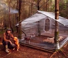 дебил....притащить с собой буржуйку и рулон плёнки....а палатку тяжело нести было???? Хотя уверен там где то рядом и машина есть.