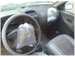 Странно, что не смогли подушку на руль закрепить. 
Это же не сложно.