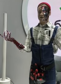 Работу сменил? Вроде, на прошлой выставке он сантехником был или ещё каким мастеровым.