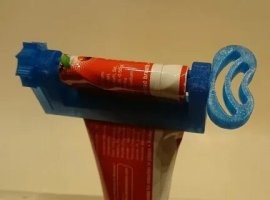 Напечатал на принтере такую крутилку - выжимает тюбик в ноль.