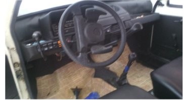 У моего брата, Ока была в 2002 году, для инвалидов. 
Там была дополнительная ручка сцепления. 

Слева от руля, вот так: