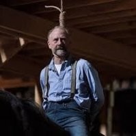 Приёмный отец тоже выжил, его потом в Ходячих повесили.