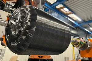 Аэро-космическая приблуда. Кусок бака из композитного углеродного волокна. Троху подгорел и оплавился из-за высоких температур трения о воздух, и прочих экстремальных режимов работы.