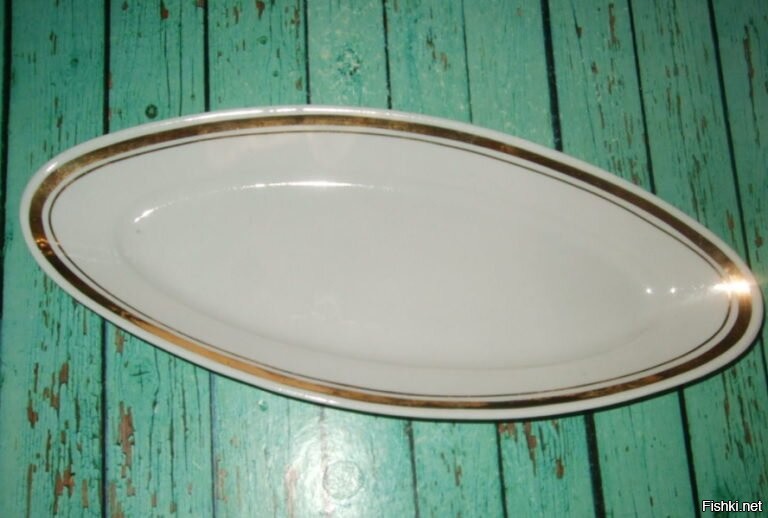 Нужно селёдочку вот сюда положить. И маслицем подсолнечным...