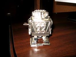 ох, накатило))) только забыли про шагающих заводных роботах, у которых на пузе кружок красно-жёлтый крутился. до сих пор храню как память