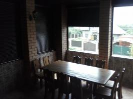 Как видите, по сути это крытый балкон, т.к. все проемы без окон. Рольставни закрывают только от непогоды.