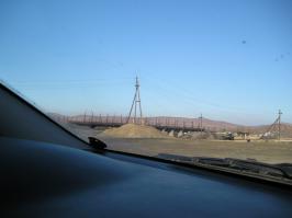 Самое "интересное" не сфотографировали - пейзаж вокруг завода и отвалы шлака.

Недостроенный мост по утрам в дымке от выбросов мне всегда напоминал пейзаж игры FallOut. Вокруг всё красно-жёлтое... то ещё место.