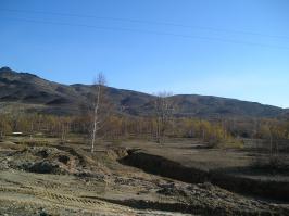 Самое "интересное" не сфотографировали - пейзаж вокруг завода и отвалы шлака.

Недостроенный мост по утрам в дымке от выбросов мне всегда напоминал пейзаж игры FallOut. Вокруг всё красно-жёлтое... то ещё место.