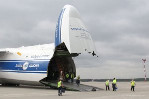 Мда, ну как можно рассуждать об модернизации не зная ничего про самолет?

Руслан Ан-124
имеет:
подъемный нос - основной метод погрузки
Рампу в хвосте - дополнительный

Ан-225 рампы не имеет