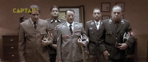 Индия фильм представляет!
К Гитлеру приходит высокий красавец - доктор Геббельс. Гитлер ниже его на пару голов. Гитлер в этот момент читает Шекспира.Рядом стоят генералы - истинные арийцы, слепо преданные своему Фюреру. В это время Геринг выступает перед войсками. Гитлер злиться и поет песни узнав что Красная Армия вошла в  Берлин!