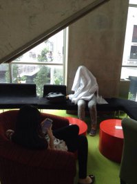 Здесь вроде ничего особенного - кормит ребёнка грудью, вот и прикрылась.