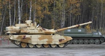 Подумал бы, что это модификация Т-90, но здесь 7 катков. При этом на Армату не тянет, наверно 195-ый. Если уж Т-90-СМ показывают таким - может он и есть Армата