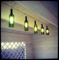 Я себе на даче люстру из бутылок сделал в беседку))
