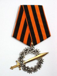 Не туда копаете. Начинать стоило со  «Знака отличия военного ордена»  и с памятных медалей Ледового Похода.