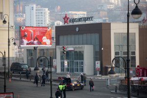 О какой фотографии Владивостока в 2014 идёт речь? На этом фото нет даже терминала аэроэкспресса, который строили к саммиту АТЭС в 2012 г.