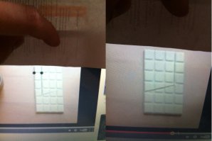 приложи лист бумаги к краю, как на фотке и жди окончания видео.