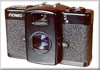 ещё в 80х делал фото на слайд.пленку,используя примерно такую приспособу



но с таким фотиком



хорошо получались пейзажи