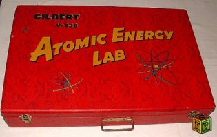 Хочу рассказать про одну не очень хорошею игрушку, выпущенную даже с очень благими целями в 1950 году. Речь пойдет о Gilbert U-238 Atomic Energy Laboratory ("Лаборатории Атомной Энергии U-238"). В 1950 году на свет появляется набор "Лаборатории Атомной Энергии U-238" разработанный совместно со многими специалистами и привлечением факультета Массачусетского Технологического Института. Чтобы игрушка помогла юному поколению лучше понять химию и ядерную физику, да и в конце концов, подготовить будущих инженеров и специалистов. Продавался этот набор недолго с 1950-1951 год. Возможно это было связано с опасностью набора и то, что из-за него погиб не один ребёнок. 
В набор Gilbert U-238 Atomic Energy Laboratory входили: - Радиометр U-239 он же U-239 счетчик Гейгера. – Электроскоп. – Спинтарископ. - Камера Вильсона. - Три источника с низким уровнем излучения: - Альфа-частицы (Pb-210 и Po-210), - Бета-частицы (Ru-106), - Гамма частиц (Zn-65), - Четыре образца урановых руд, - «Ядерная Сфера», применяющаяся для построения визуальной модели молекул. - Книга «Поиск Урана», - « атомная энергетика - руководство Гилберта», - Комикс «Узнай, как Дагвуд расщепил атом»
- 3 батарейки, - и каталог игрушек компании за 1951 год. Всё это продавалась за 50 тогдашних долларов. В красивом красном чемодане обтянутым под змеиную кожу (конечно же заменителем). Это был довольно хороший и интересный набор для ребёнка вот только не безопасный.